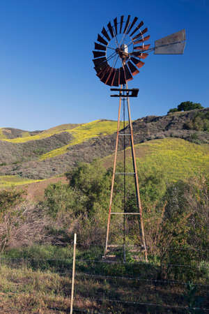 Old wind mill, La Canada' Road in spring, near Ventura, California, USAの写真素材