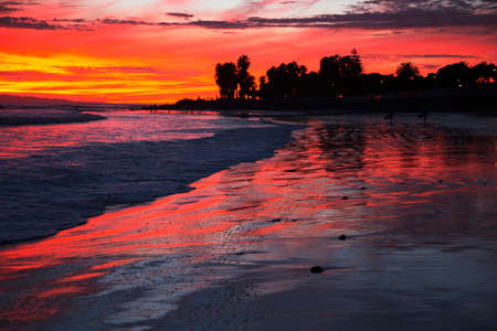 Deep purple and orange sunset looking towards Anacapa Island, Ventura, California, USAの写真素材