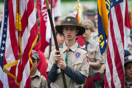 Boyscouts display US Flag at solemn 2014 Memorial Day Event, Los Angeles National Cemetery,...