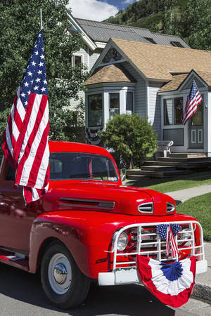 Antique Red Truck and US Flag, July 4, Independence Day Parade, Telluride, Colorado, USAのeditorial素材
