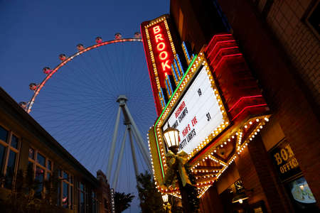Las Vegas, Nevada, USA -  Brooklyn neon theater sign in front of The High Roller Ferris Wheel at dusk off the Strip in Las Vegas, Nevada, USAのeditorial素材