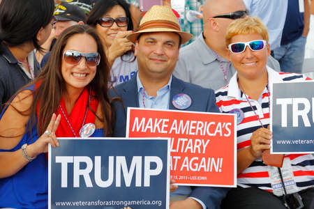 SAN PEDRO, CA - SEPTEMBER 15, 2015: Battleship USS Iowa in San Pedro, California, U.S., Trump Presidential Campaign supporters with signs, on Tuesday, Sept. 15, 2015.のeditorial素材