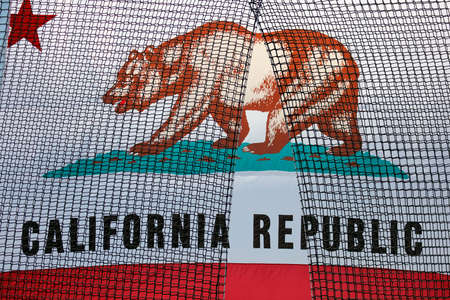 VENTURA, CA - MAY 26, 2016: State of California State Flag behind netting at Bernie Sanders campaign...