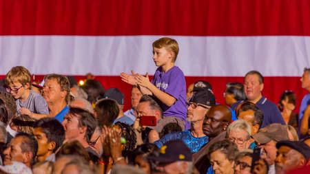 OCTOBER 12, 2016, Boy Claps for Democratic Presidential Candidate Hillary Clinton as she campaigns at the Smith Center for the Arts, Las Vegas, Nevadaのeditorial素材