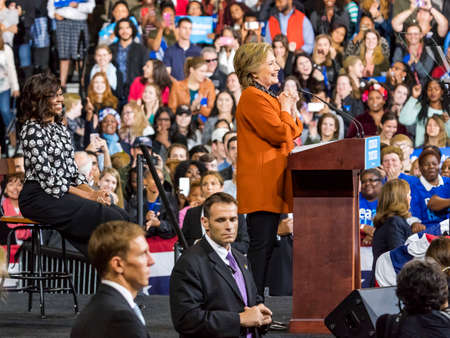 WINSTON-SALEM, NC - OCTOBER 27 , 2016: Democratic presidential candidate Hillary Clinton and US First Lady Michelle Obama appear at a presidential campaign event.のeditorial素材