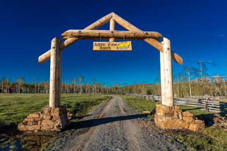 APRIL 27, 2017 - HASTINGS MESA near RIDGWAY AND TELLURIDE COLORADO - Aspen View Ranch gate in San Juan Mountains - ranch owned by photographer Joeph Sohmのeditorial素材