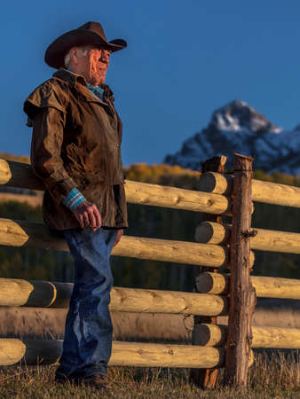 OCT 4, 2017, RIDGWAY COLORADO - Cowboy, Howard Linscott looks out over historic Last Dollar Ranch on Hastings Mesa, SW Colorado, San Juan Mountainsのeditorial素材