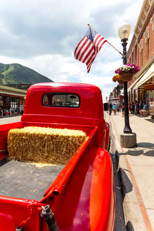 TELLURIDE, COLORADO, USA - July 4, 2018 - Annual  Independence Day Parade, Telluride, Colorado Colorado Avenue - features vintage Ford Red Pickup Truckのeditorial素材
