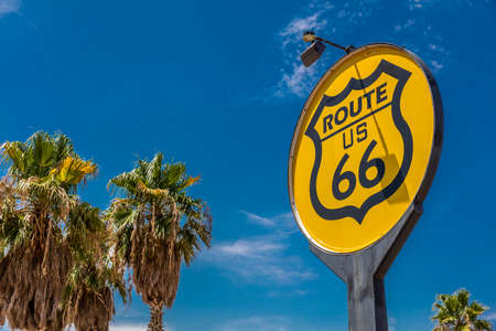 JULY 30, 2018 - SOUTHERN CALIFORNIA DESERT - USA - Yellow sign signifies Route US 66 - Nostalgia in middle of California Desertのeditorial素材