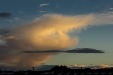 October 9, 2018 Santa Fe, NM, USA - White puffy clouds at sunset Santa Fe New Mexicoのeditorial素材