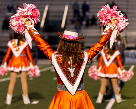 OCTOBER 12, 2018, PARIS TEXAS, USA  - Celina Cheerleaders at high school football game - Paris Wildcats win over Celina Bobcats 54-7 in High School Football Gameのeditorial素材