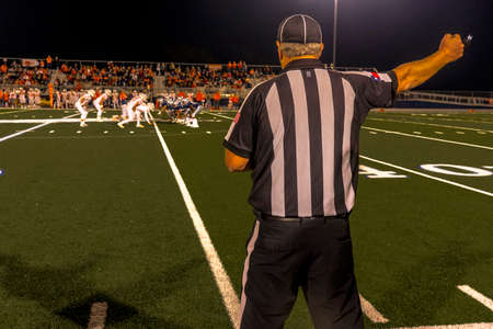 OCTOBER 12, 2018, PARIS TEXAS, USA - referee at Paris Texas Wildcats High School Division 4 Football Gameのeditorial素材