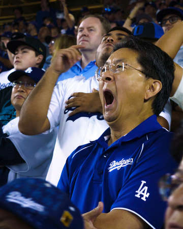 OCTOBER 26, 2018 - LOS ANGELES, CALIFORNIA, USA - DODGER STADIUM: fans celebrate as LA Dodgers defeat Boston Red Sox 3-2 in game 3, the longest game in World Series History - 18 innings, 7 hours , 20 minutes.のeditorial素材
