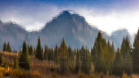 SEPTEMBER 19, 2018 - COLORADO, USA, Impressionistic pine trees and mountain at Molas Lake, South of Silverton, Route 550, Coloradoのeditorial素材