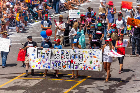 TELLURIDE, COLORADO, USA - July 4, 2018 - Annual  Independence Day Parade, Telluride, Colorado Colorado Avenue - features banner "FAMILIES BELONG TOGETHER"のeditorial素材