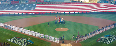 OCTOBER 26, 2018 - DODGER STADIUM, LOS ANGELES, CALIFORNIA, USA - giant US Flag is unfurled for World Series Game 3 opening ceremonies of Los Angeles Dodgers versus Boston Red Sox. Dodgers won 3 to 2 in 18 inningsのeditorial素材