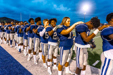 OCTOBER 12, 2018, PARIS TEXAS, USA - Star Spangled Banner performed. - Paris Texas Wildcats defeat Celina, Bobcats 54-7 in High School Division 4 Football Gameのeditorial素材