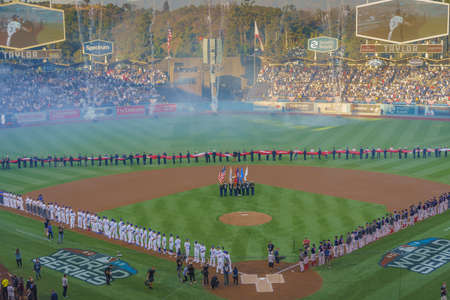 OCTOBER 26, 2018 - DODGER STADIUM, LOS ANGELES, CALIFORNIA, USA - giant US Flag is unfurled for World Series Game 3 opening ceremonies of Los Angeles Dodgers versus Boston Red Sox. Dodgers won 3 to 2 in 18 inningsのeditorial素材