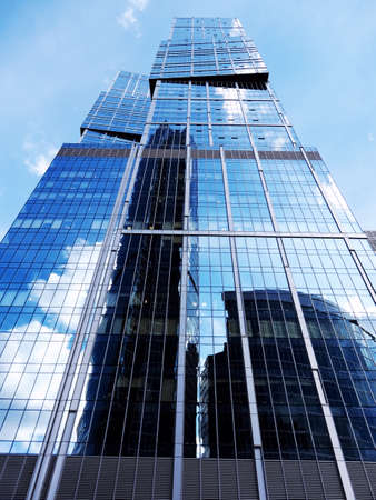 Moscow City - the largest financial center in Europe, sky and clouds reflected in the glass walls of skyscrapers, create amazing effectsのeditorial素材