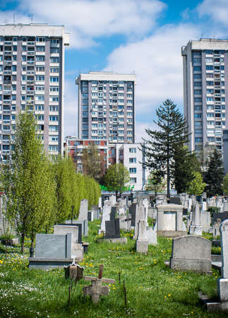 Old Graveyard near buildings in Sarajevoの写真素材