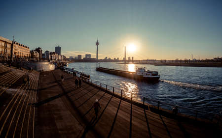 Dusseldorf Altstadt Old Town Rheinuferpromenade in Sunsetのeditorial素材