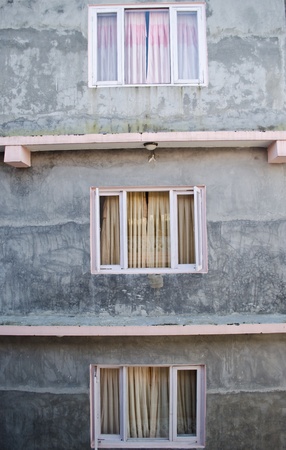 pink windows on cement wallのeditorial素材