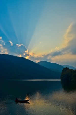sunset at phewa lake in nepalの写真素材