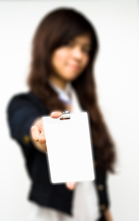 business woman showing blank id cardの写真素材