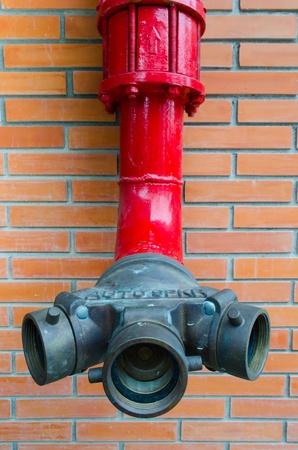 red water pipe with three way connect headの写真素材