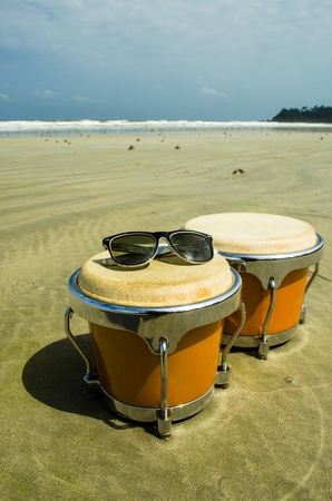 latin percussion called bongo on the beachの写真素材