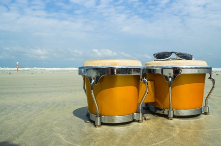 latin percussion called bongo on the beachの写真素材