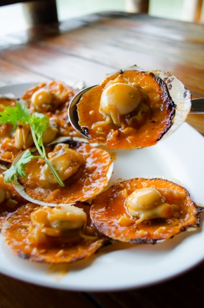 shell with spicy sauce  serve in thai restaurantの写真素材