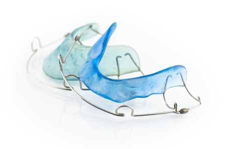 close up of blue dental braces isolated on white backgroundの写真素材