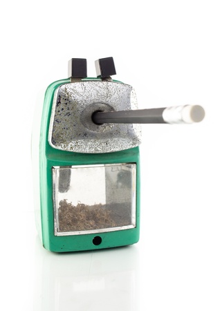 old green stapler isolatedmon white backgroundの写真素材