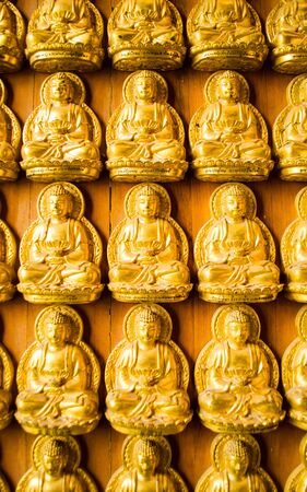 many of mini buddha statue for backgroundの写真素材