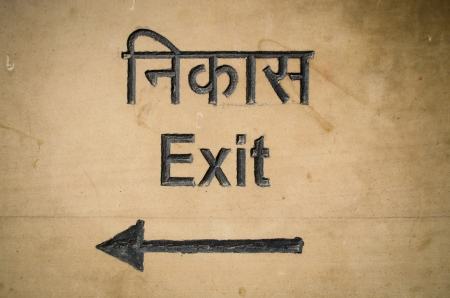 concrete exit sign with indian languageの写真素材