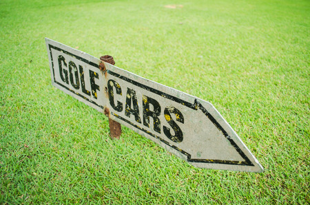 rusty golf cart signの写真素材