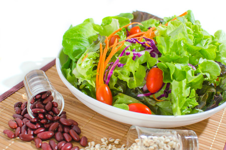 salad and salad cream on white backgroundの写真素材