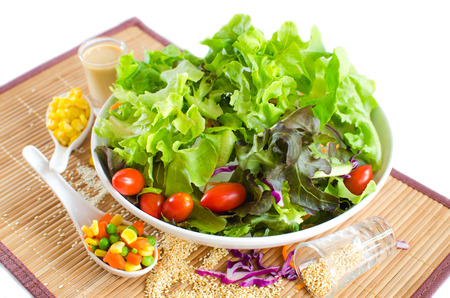salad and salad cream on white backgroundの写真素材