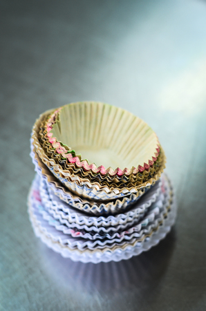 stack of paper cup cake moldの写真素材