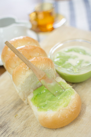 bread and pandan cream serve with hot teaの写真素材