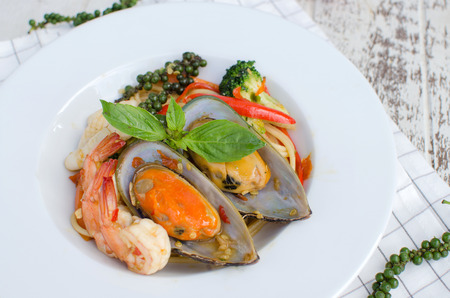 "Pad Kee Mao spagheti seafood" is the spagheti cook with spicy herb in thai styleの写真素材