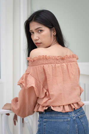 portrait of thai woman dressed in pinkの写真素材