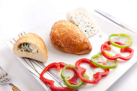 Pate stuffed with blue cheese with red and green pepperの写真素材