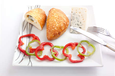 Pate stuffed with blue cheese with red and green pepperの写真素材