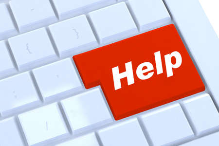 help button in red on a modern silver keyboardの写真素材