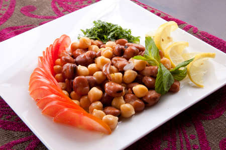 Broad Bean with olive , Lemon, garlic and tomatoの写真素材