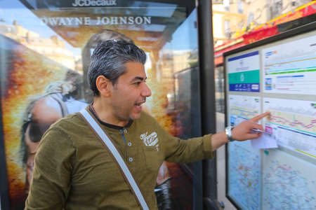 PARIS, FRANCE - February 18 , Tourists stroll at The most famous avenue of Paris and is full of stores, cafes and restaurantsのeditorial素材