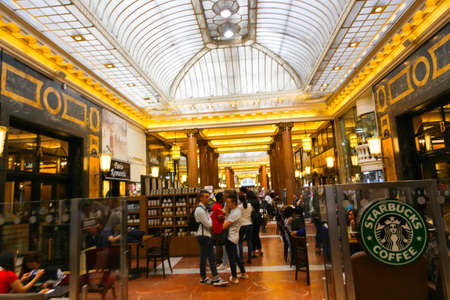 PARIS, FRANCE - February 20: The : inside part of the famous Mall Lafayette with it's brand stands Saint Laurent, Jean Paul Gaultier, Lancome and customersのeditorial素材