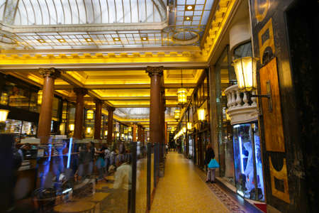 PARIS, FRANCE - February 20: The : inside part of the famous Mall Lafayette with it's brand stands Saint Laurent, Jean Paul Gaultier, Lancome and customersのeditorial素材